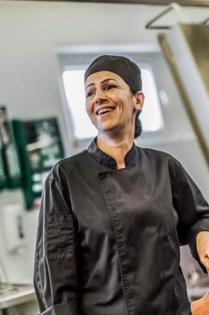 Female cook smiling